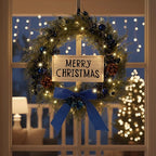 Lighted Christmas Artificial Cedar Wreath for Front Door with Hanger Christmas Wreaths Faux Norfolk with Velvet Bow LED Lights Jingle Bells Pinecone Berries Indoor Window Xmas Holiday Decor(Blue)